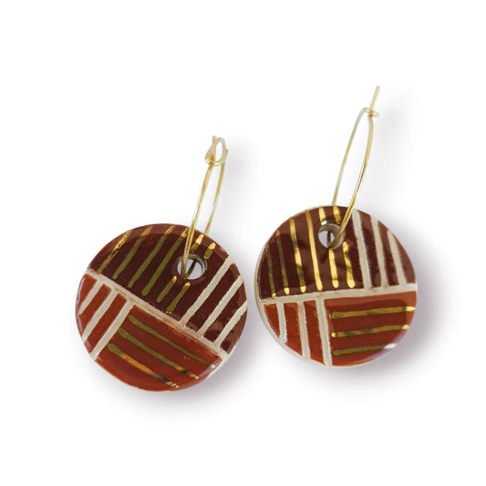 Pendientes geométricos de cerámica blanca y oro en acero inoxidable